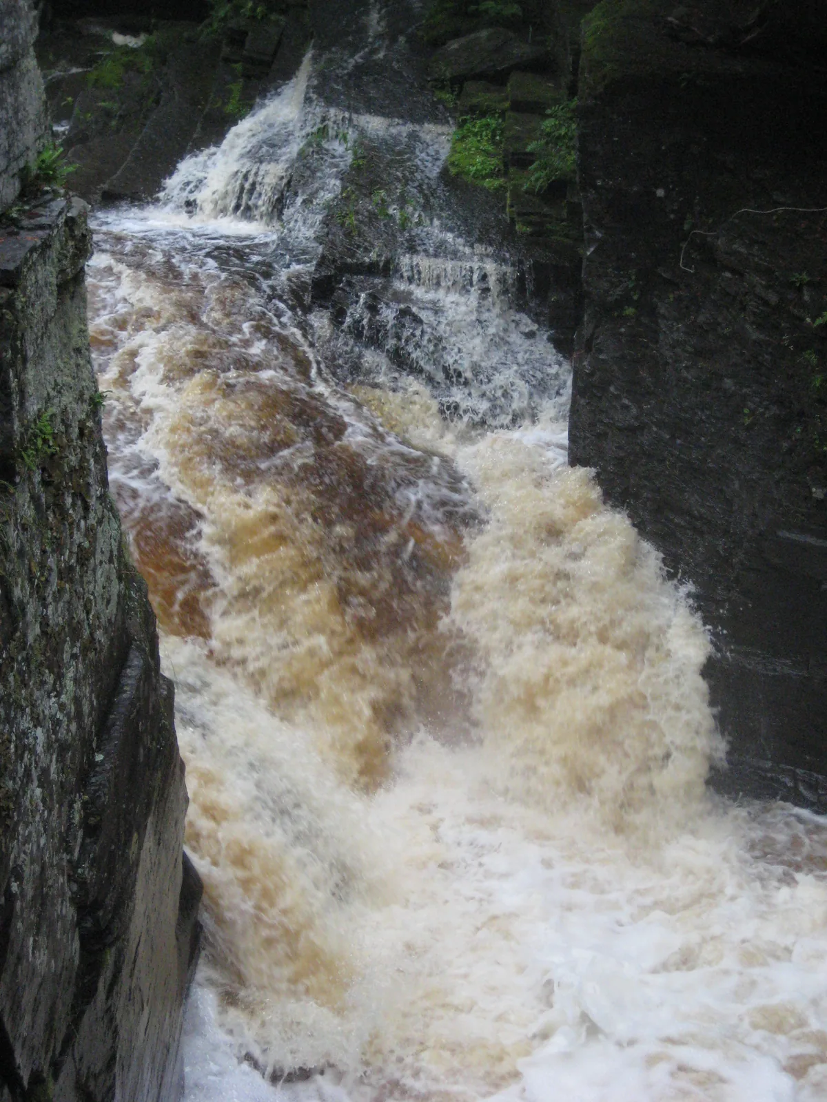A churning drop above the cliff-jumping spot