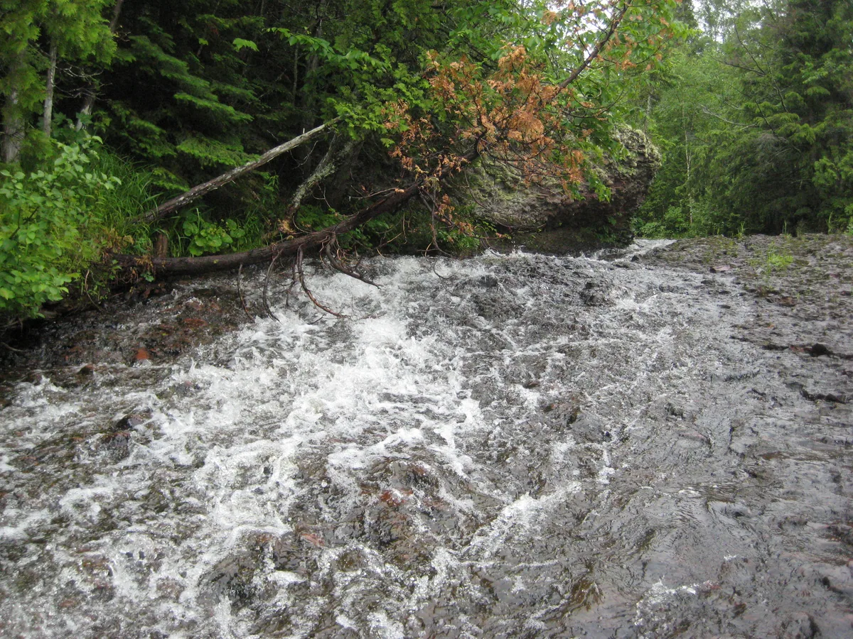 Skidding water over conglomerate rock