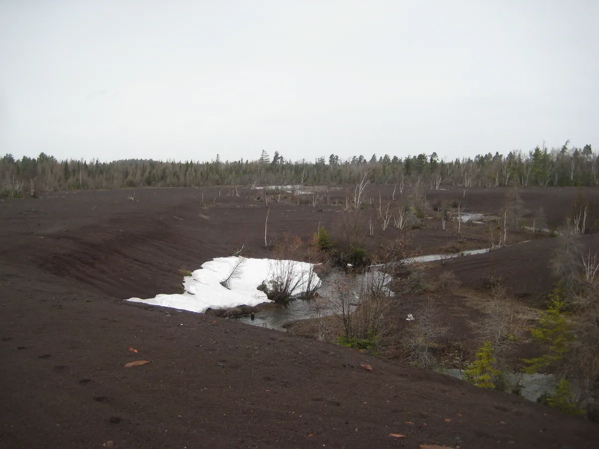 Adit creek snaking through the stamp sands