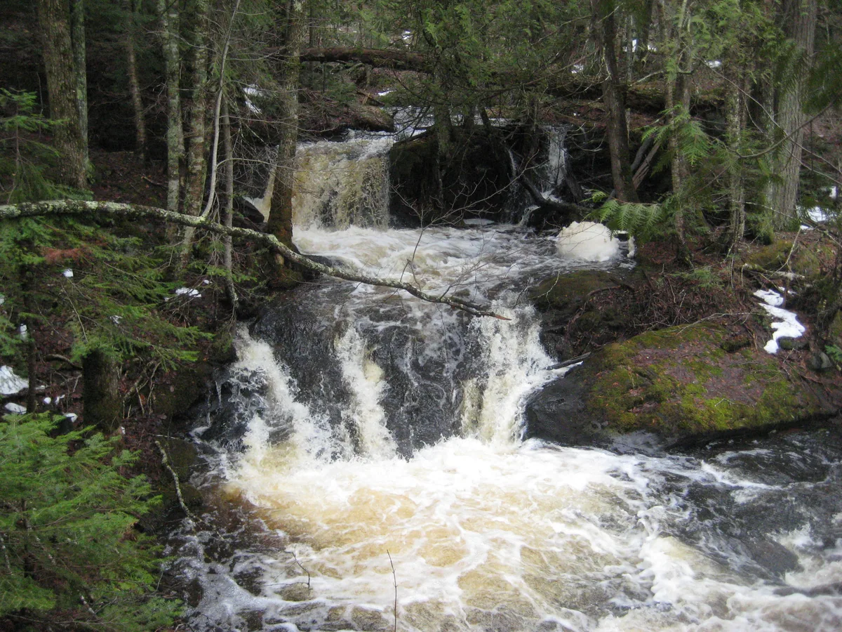 Narrow chute between mossy banks