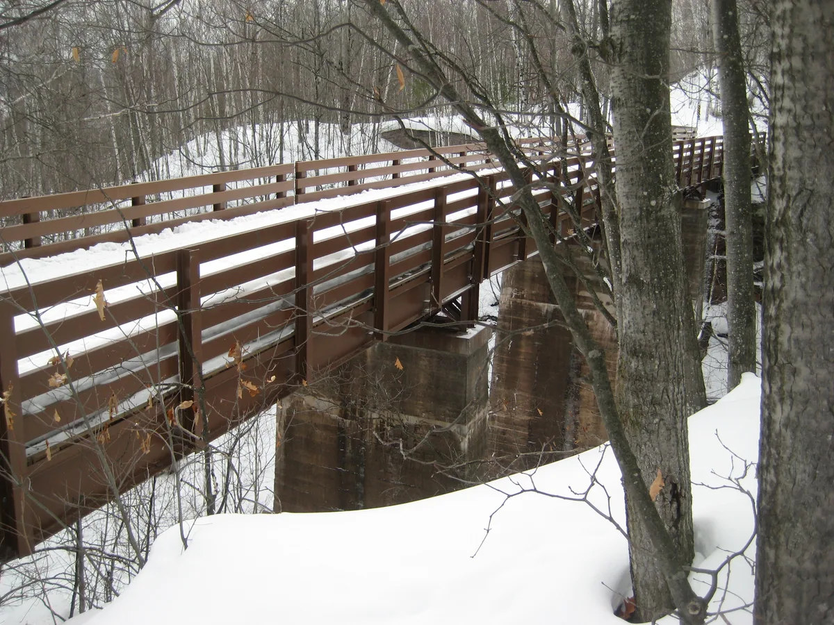 Wooden bridge over the old trestle