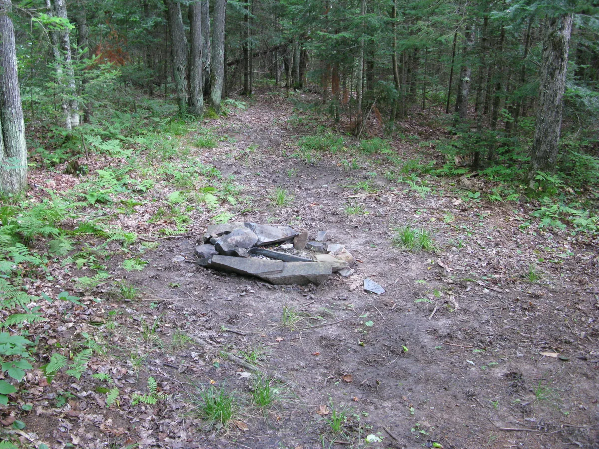 Small campsite with a fire ring