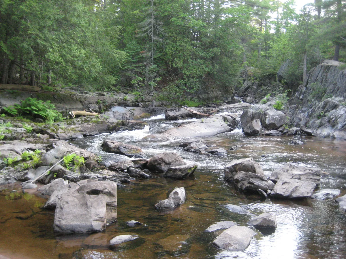 Boulders strewn through the river