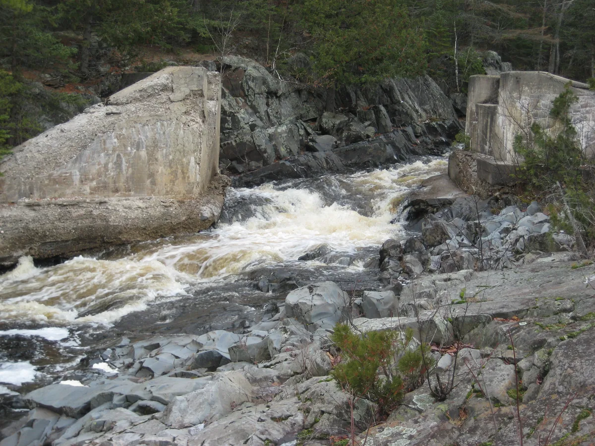 An old railroad crossing above the falls