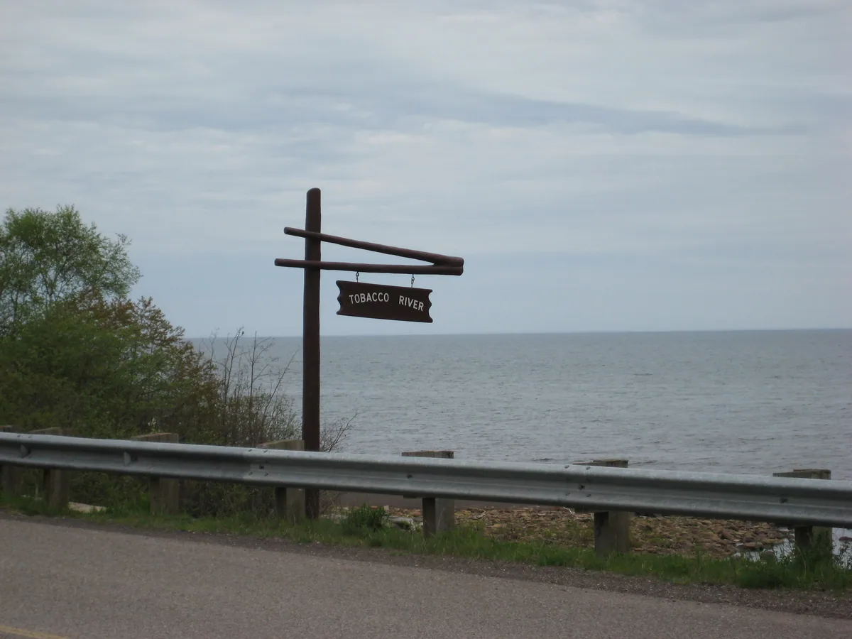 Park sign against Lake Superior