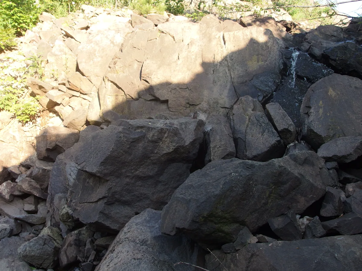 Bright sun on the rock wall