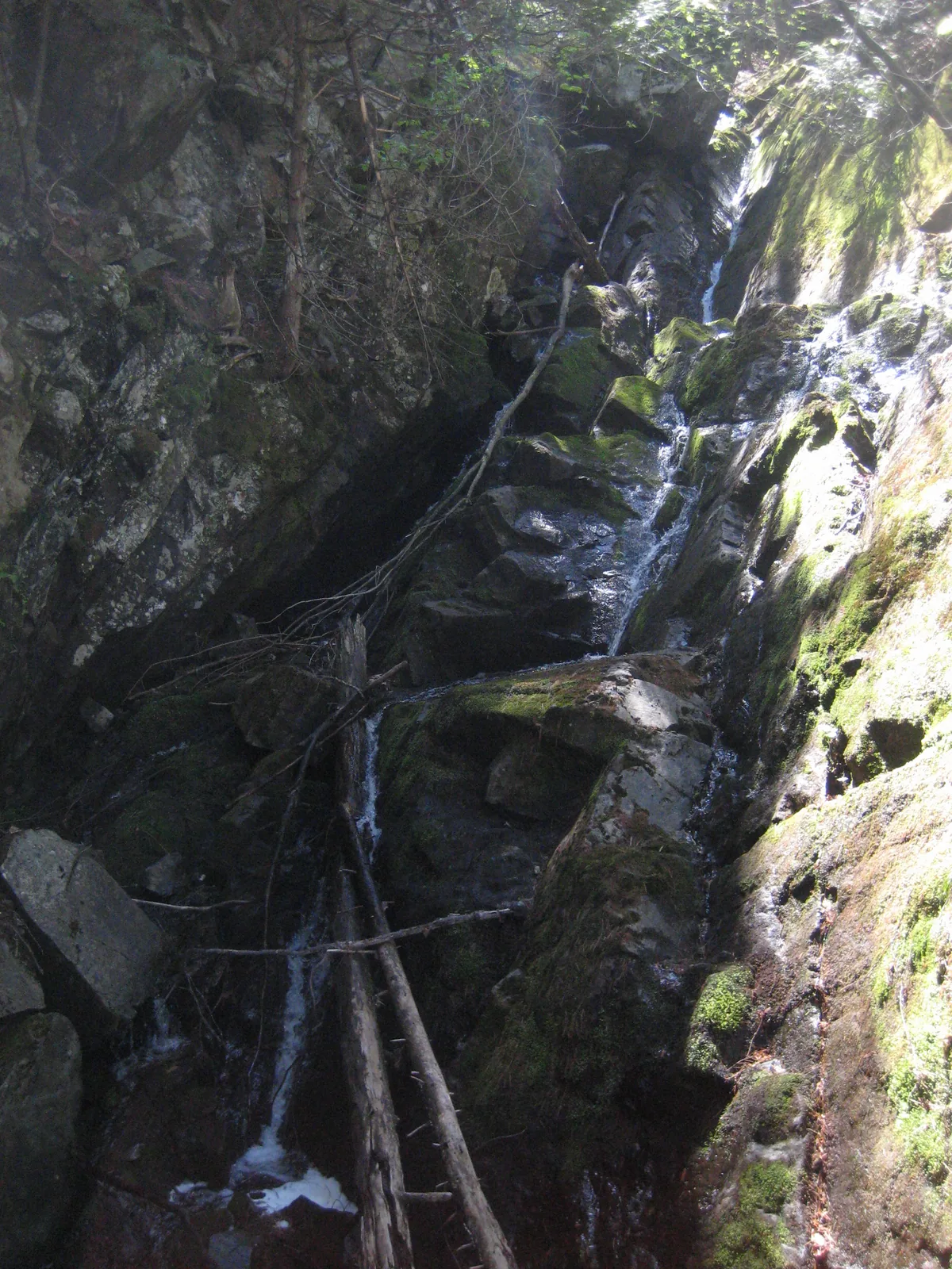 Long chain of chutes between huge rocks