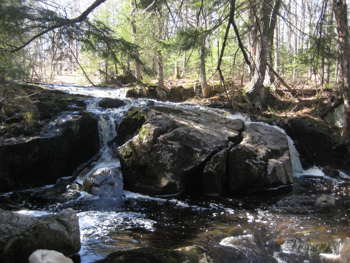 Smooth rounded rocks on the uppermost drop