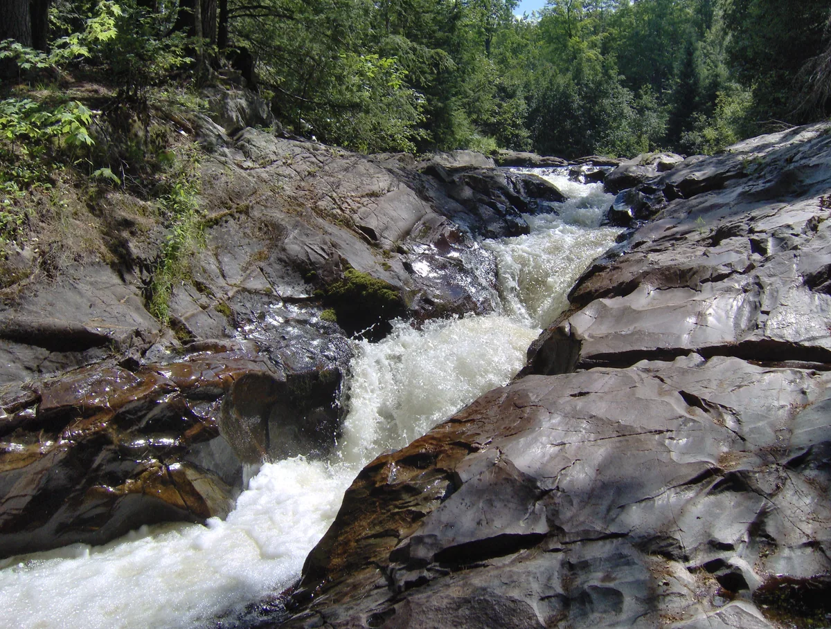Narrow channel foaming up the Yellow Dog River